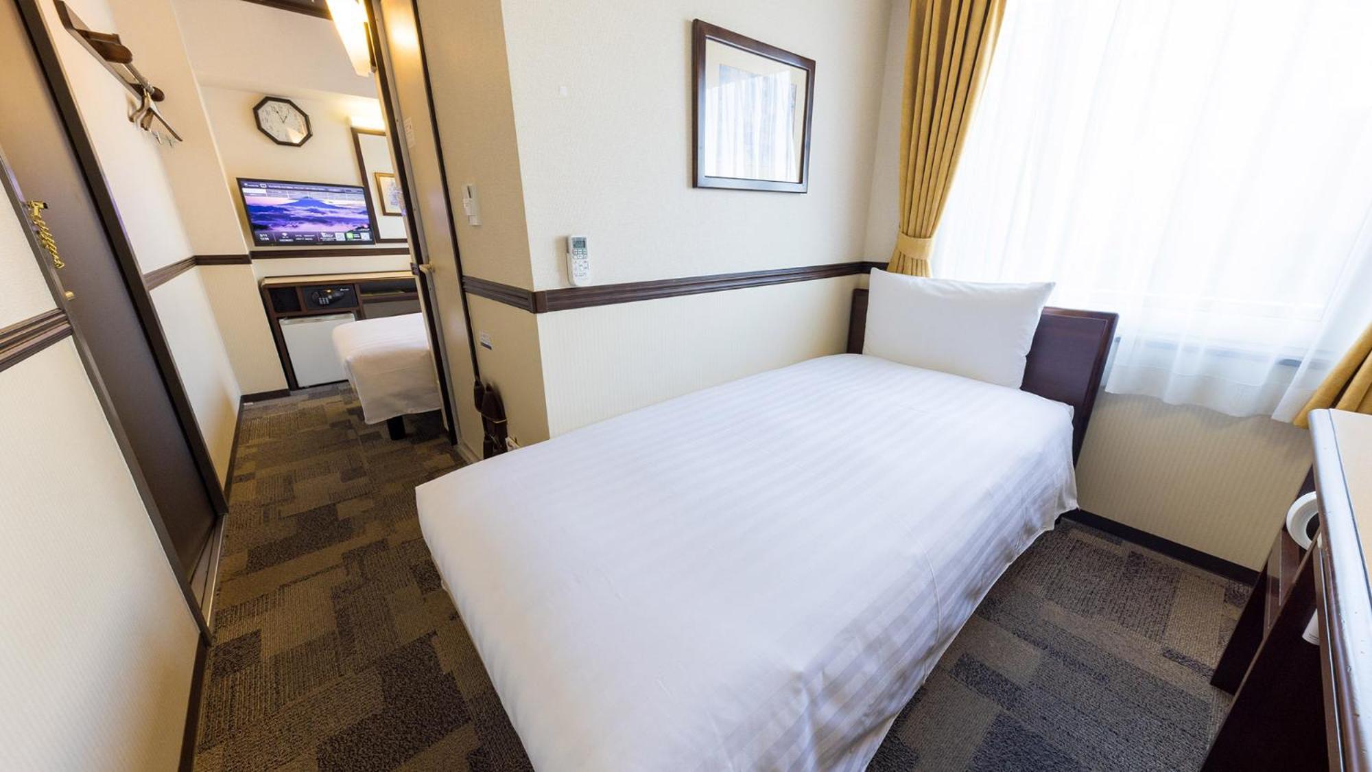 Toyoko Inn Osaka Shinsaibashi Nishi Rum bild