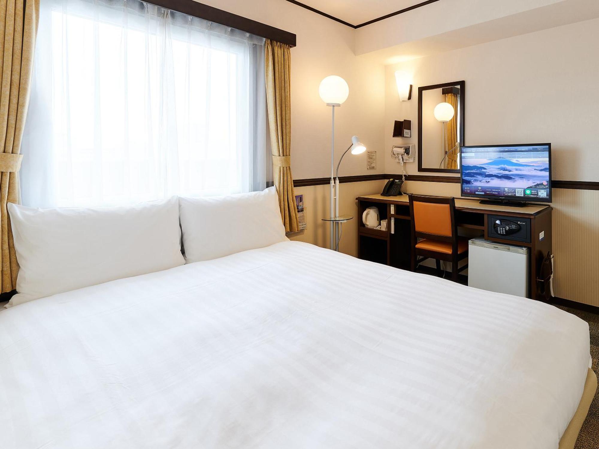 Toyoko Inn Osaka Shinsaibashi Nishi Rum bild